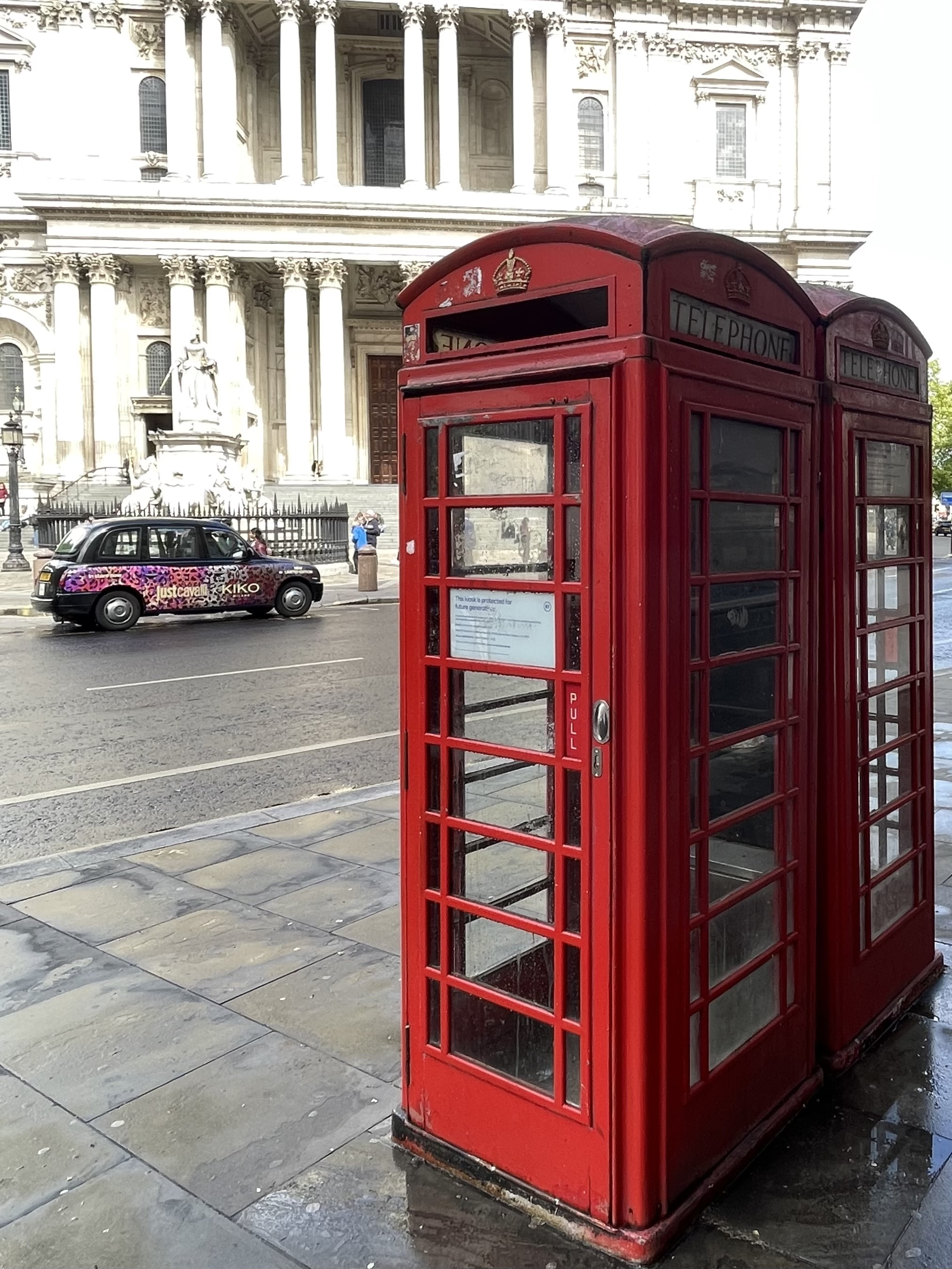 Red telephone box in St Paul’s Churchyard, London