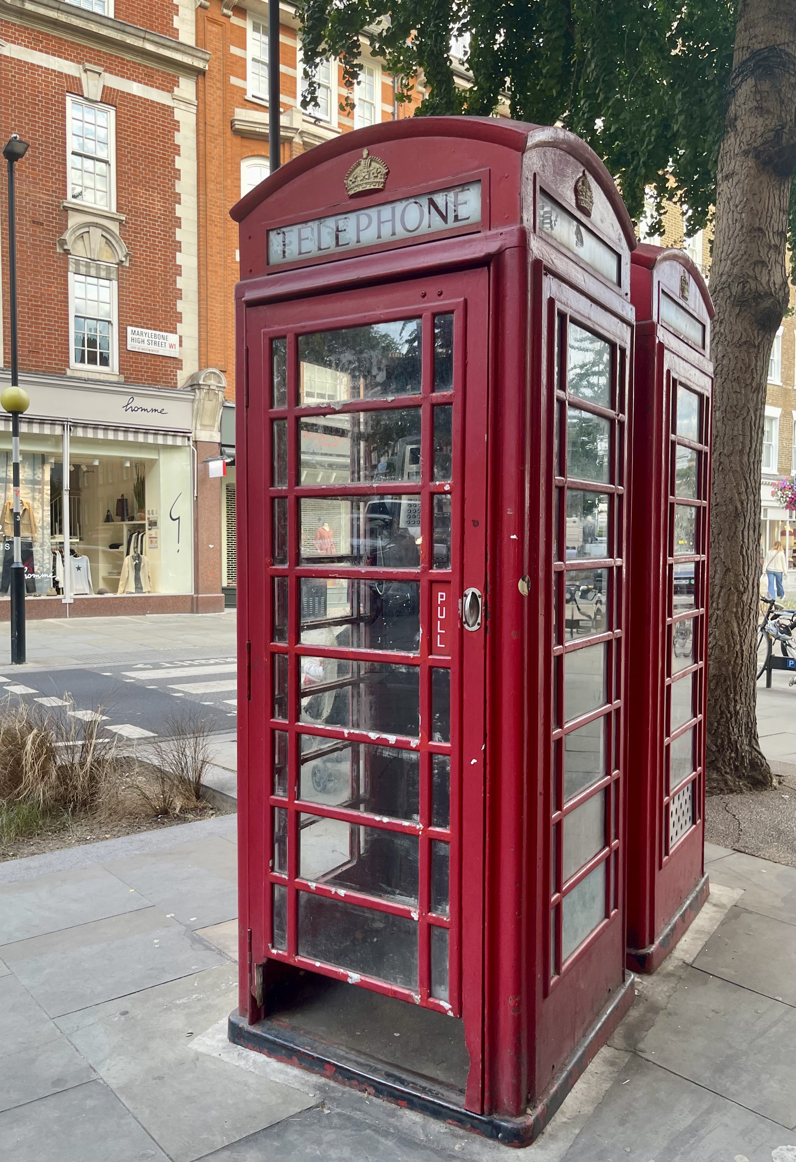 Red telephone box in Marylebone High Street, London W1